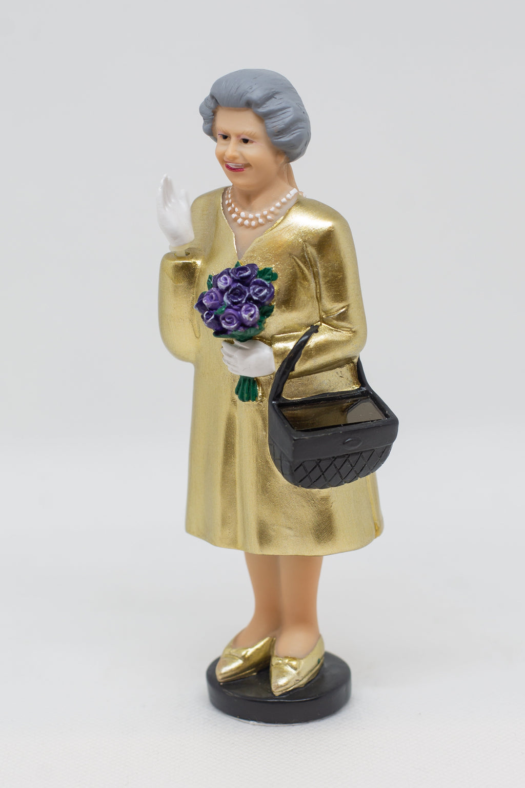 Statuetta Queen Elizabeth gold edition con pannello solare Kikkerland Accessorio Kikkerland